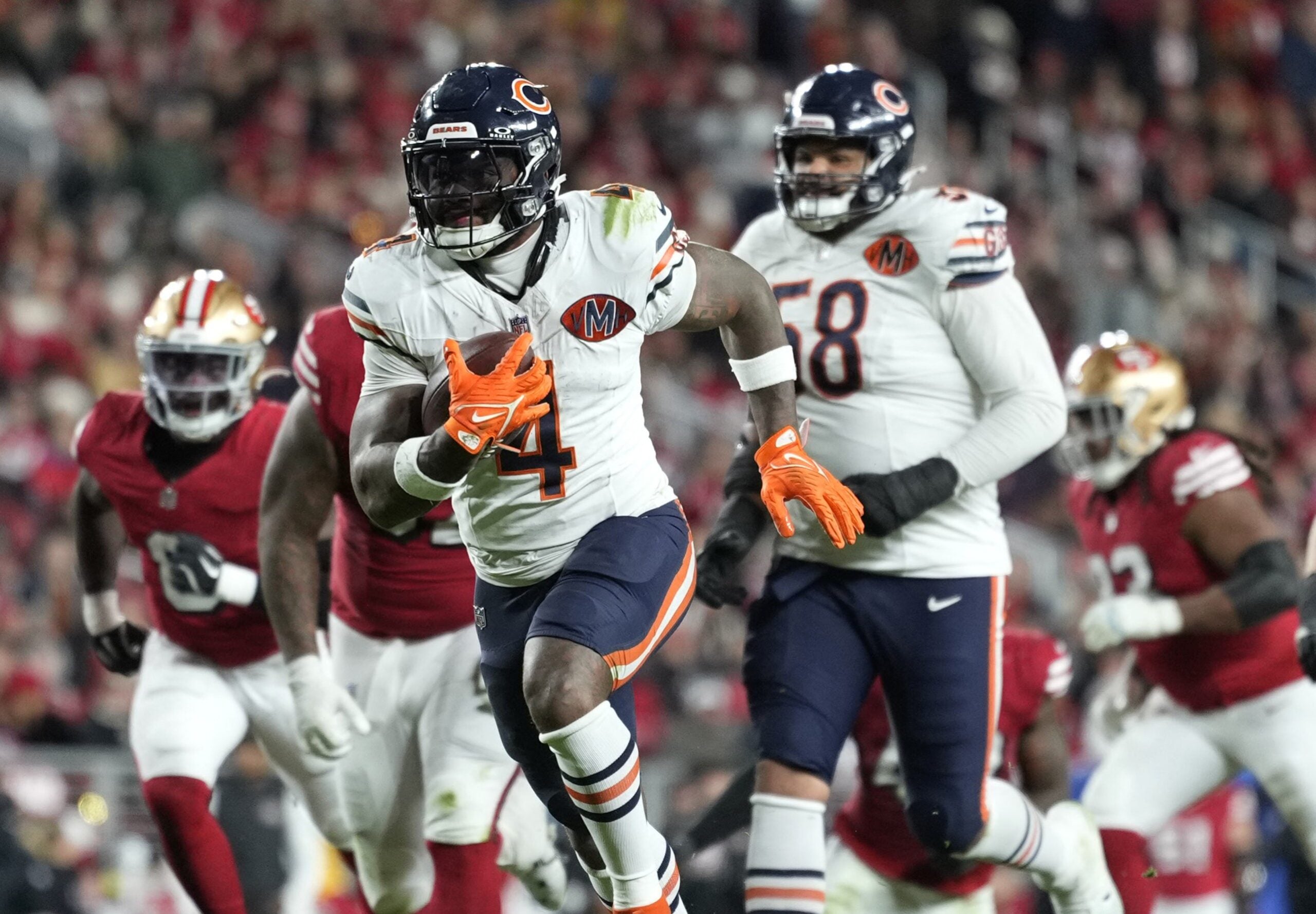 Dec 28, 2025; Santa Clara, California, USA; Chicago Bears running back D'Andre Swift (4) scores a touchdown against the San Francisco 49ers in the second half at Levi's Stadium.