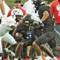 Team Roses' Easton Royal (3) looks for an opening during the Under Armour All-America Game Saturday, Jan. 3, 2026 at Spec Martin Stadium in DeLand.