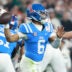 Jan 8, 2026; Glendale, AZ, USA; Mississippi Rebels quarterback Trinidad Chambliss (6) drops back to pass against the Miami Hurricanes in the first half during the 2026 Fiesta Bowl and semifinal game of the College Football Playoff at State Farm Stadium.
