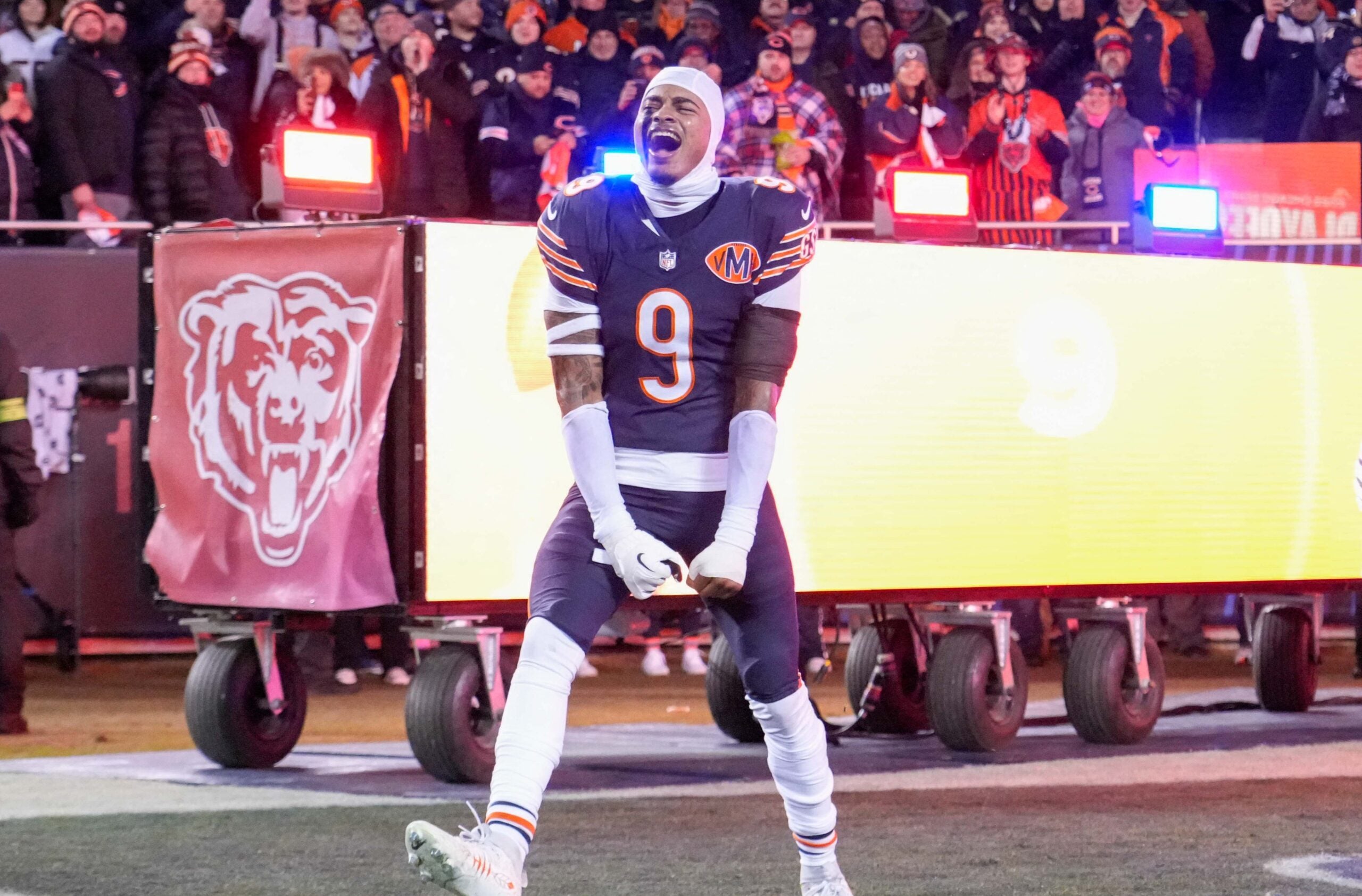Jan 10, 2026; Chicago, IL, USA; Chicago Bears safety Jaquan Brisker (9) takes the field prior to an NFC Wild Card Round game against the Green Bay Packers at Soldier Field.