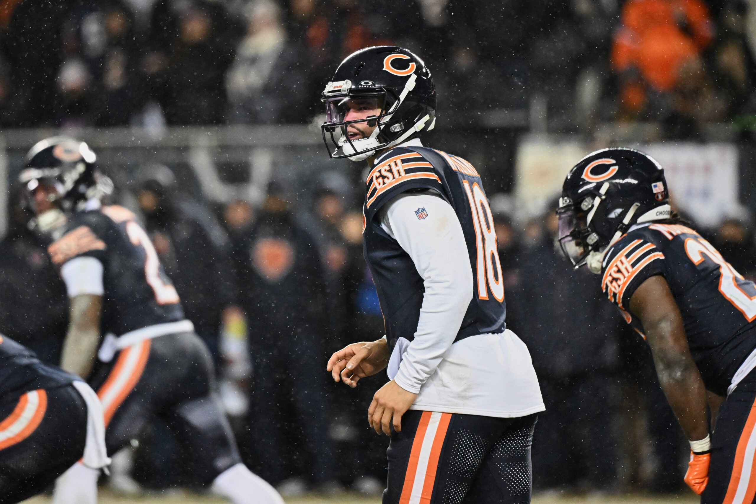 Jan 18, 2026; Chicago, IL, USA; Chicago Bears quarterback Caleb Williams (18) calls the snap count from shotgun formation against the Los Angeles Rams during the third quarter of an NFC Divisional Round game at Soldier Field.