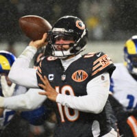 Jan 18, 2026; Chicago, IL, USA; Chicago Bears quarterback Caleb Williams (18) throws a pass against the Los Angeles Rams during the third quarter of an NFC Divisional Round game at Soldier Field.