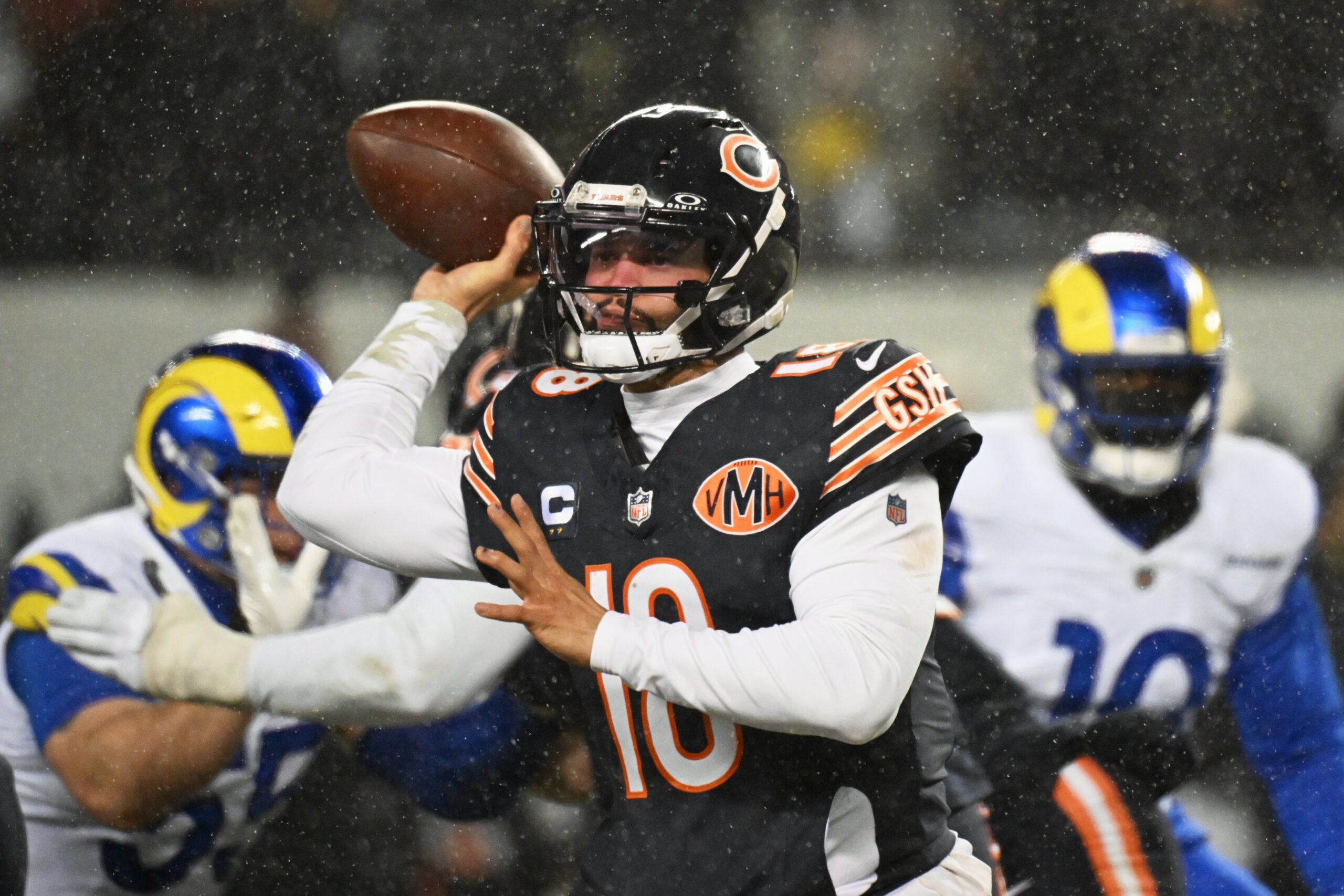 Jan 18, 2026; Chicago, IL, USA; Chicago Bears quarterback Caleb Williams (18) throws a pass against the Los Angeles Rams during the third quarter of an NFC Divisional Round game at Soldier Field.