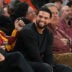 Feb 18, 2026; Los Angeles, California, USA; Chicago Bears quarterback Caleb Williams watches in the second half of the game between the Illinois Fighting Illini and the Southern California Trojans at Galen Center.