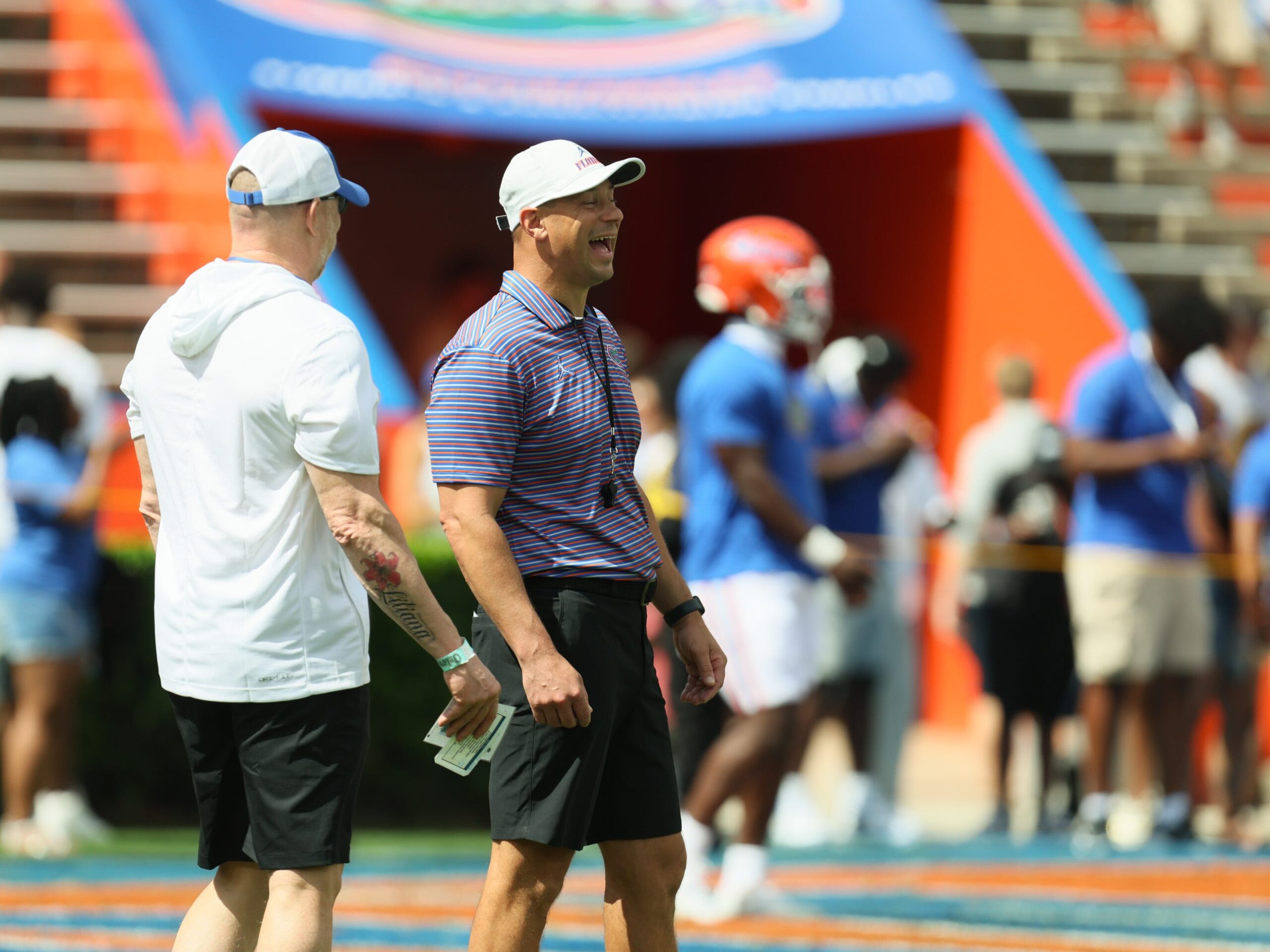 Florida head coach Jon Sumrall enjoys a laugh before the Orange and Blue game at Steve Spurrier Field at Ben Hill Griffin Stadium in Gainesville, FL on Saturday, April 11, 2026.