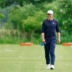 Jun 9, 2026; Lake Forest, IL, USA; Chicago Bears head coach Ben Johnson walks on the field during Chicago Bears Minicamp at Halas Hall.