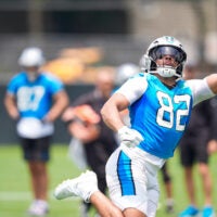 Jun 9, 2026; Charlotte, NC, USA; Carolina Panthers tight end Tommy Tremble (82) stretches for a catch during the first day of mini camp at Bank of America Stadium practice facility.