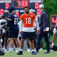 Jun 11, 2026; Lake Forest, IL, USA; Chicago Bears quarterback Caleb Williams (18) walks on the field during Minicamp at Halas Hall.