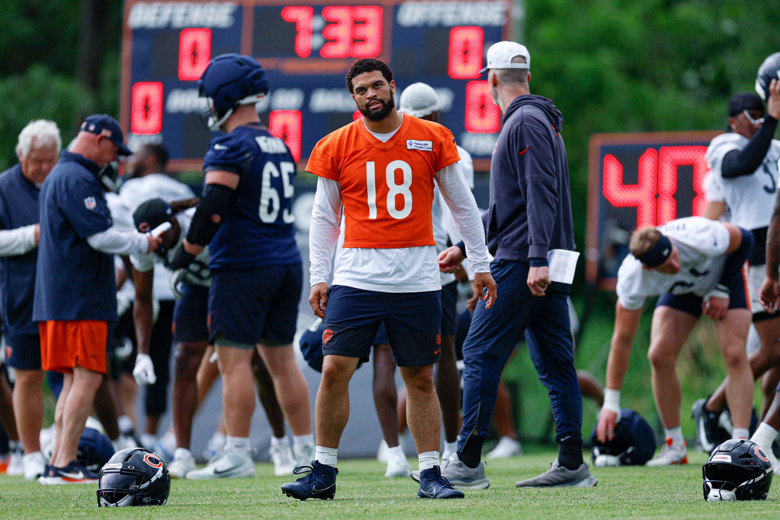 Jun 11, 2026; Lake Forest, IL, USA; Chicago Bears quarterback Caleb Williams (18) walks on the field during Minicamp at Halas Hall.