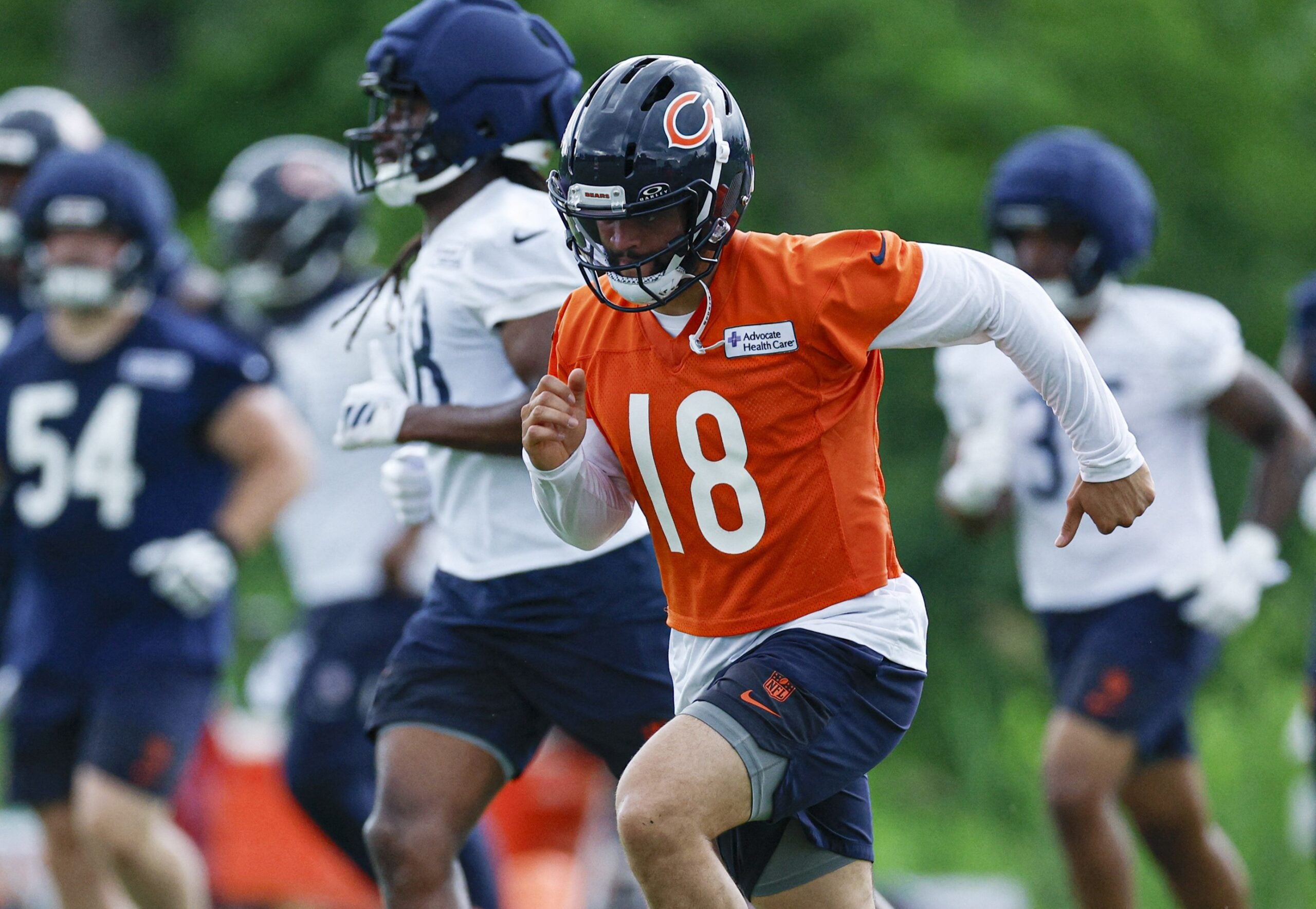 Jun 11, 2026; Lake Forest, IL, USA; Chicago Bears quarterback Caleb Williams (18) runs on the field during Minicamp at Halas Hall.