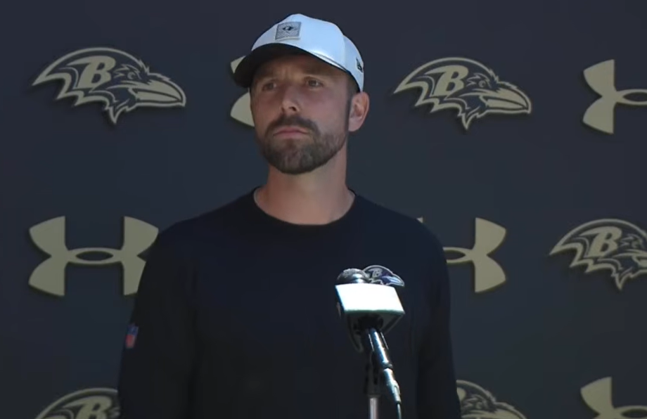 Baltimore Ravens offensive coordinator Declan Doyle speaks with reporters.