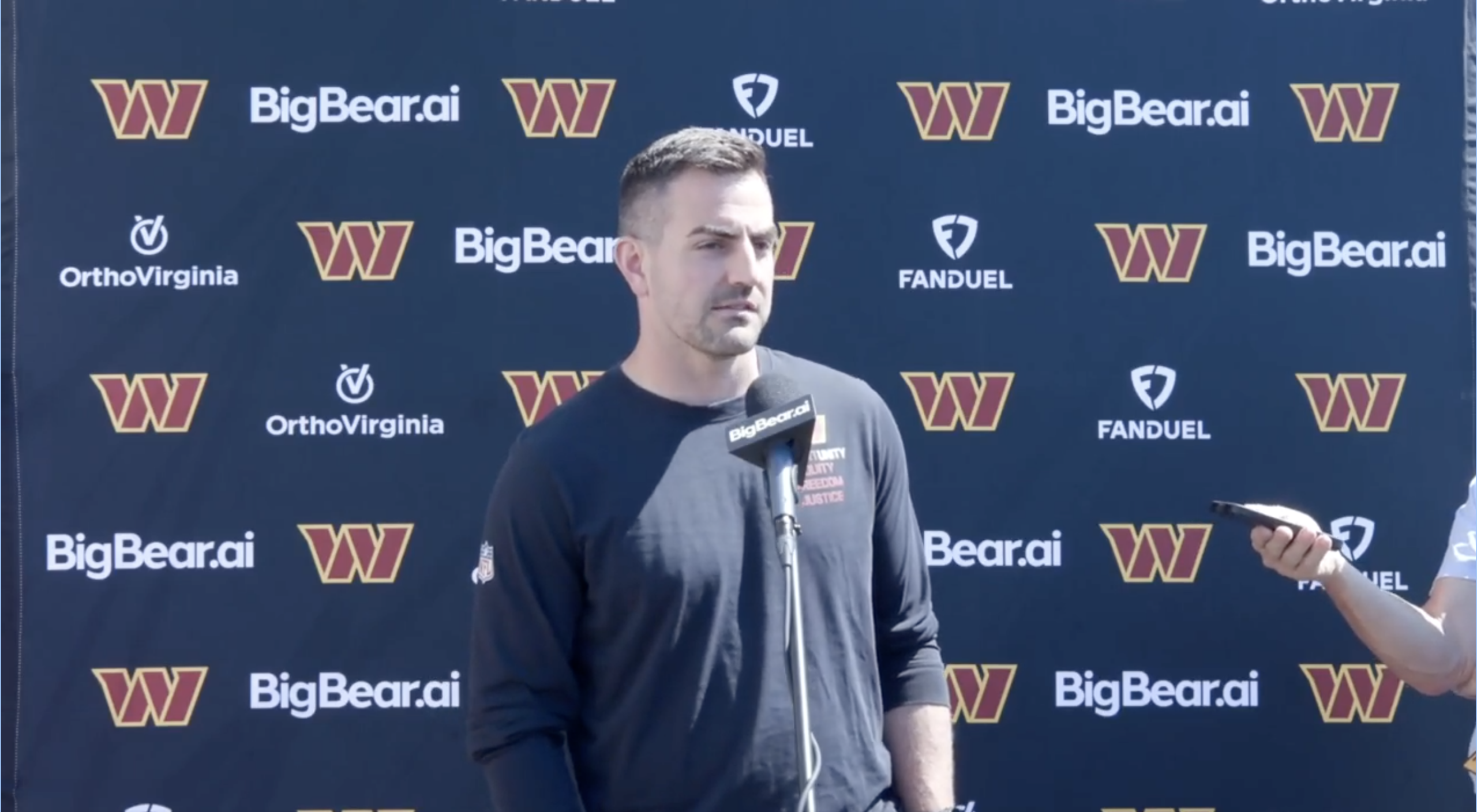 David Blough talks with reporters ahead of Commanders OTAs.