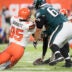 Aug 23, 2018; Cleveland, OH, USA; Cleveland Browns defensive end Myles Garrett (95) gets around Philadelphia Eagles center Stefen Wisniewski (61) to sack quarterback Nick Foles (9) for a safety during the first quarter at FirstEnergy Stadium.