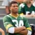 Sep 16, 2018; Green Bay, WI, USA; Milwaukee Bucks forward Giannis Antetokounmpo looks on from the sidelines during warmups priro to the game between the Minnesota Vikings and Green Bay Packers at Lambeau Field.