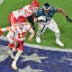 Feb 12, 2023; Glendale, Arizona, US; Kansas City Chiefs quarterback Patrick Mahomes (15) runs the ball against Philadelphia Eagles defensive tackle Javon Hargrave (97) during the fourth quarter of Super Bowl LVII at State Farm Stadium.