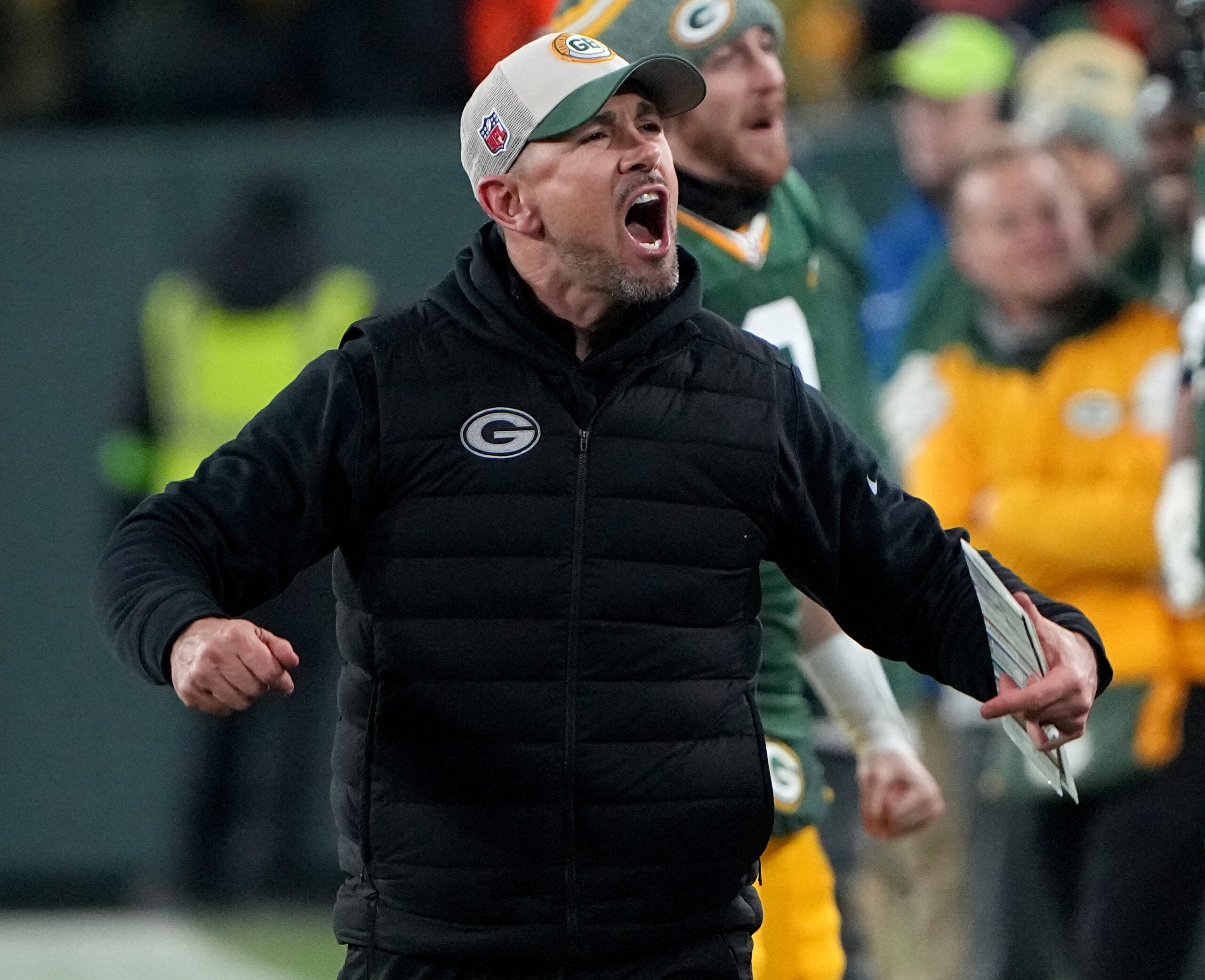 Jan 7, 2024; Green Bay, Wisconsin, USA; Green Bay Packers head coach Matt LaFleur celebrates as the clock winds down during the fourth quarter against the Chicago Bears at Lambeau Field.
