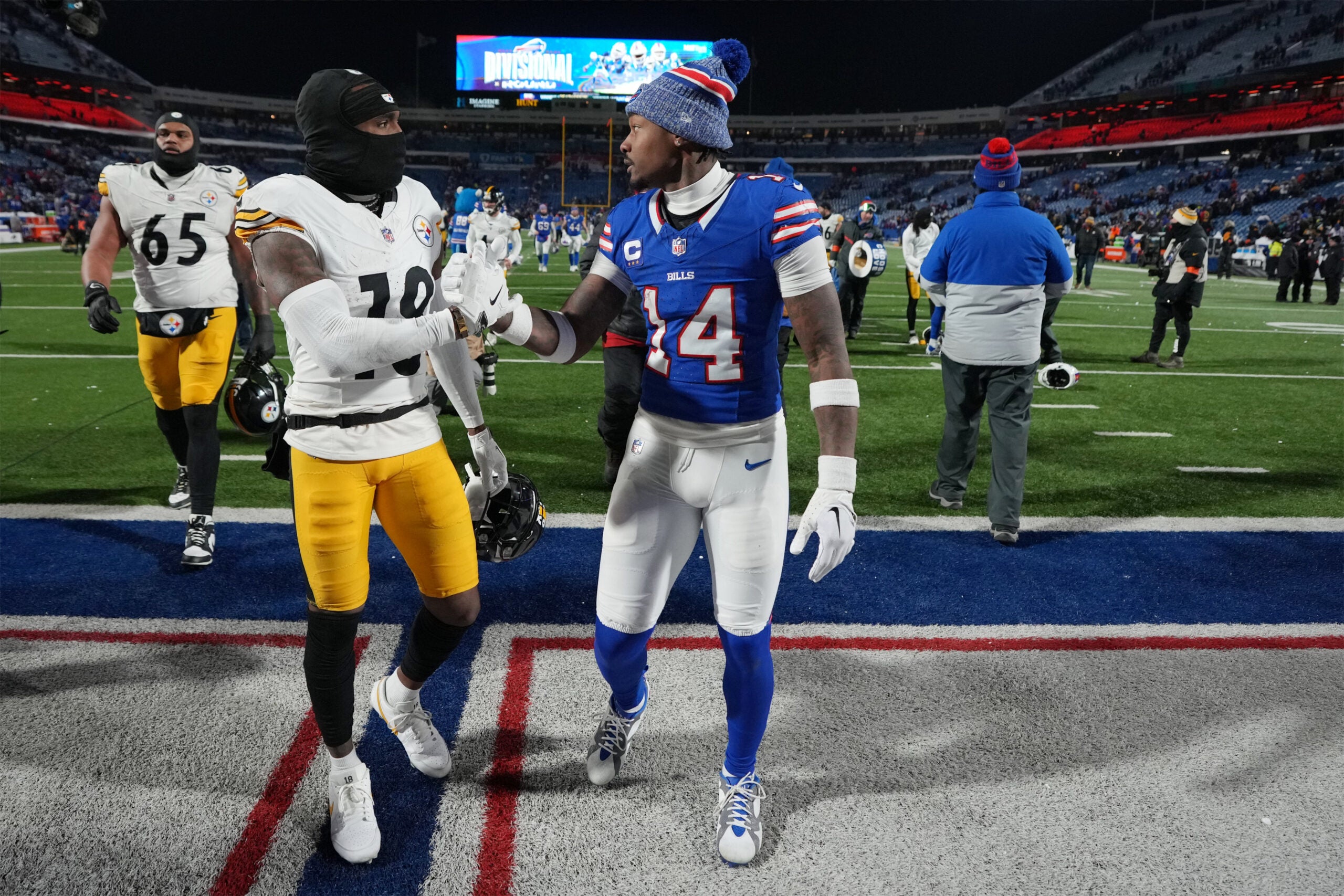Jan 15, 2024; Orchard Park, New York, USA;Pittsburgh Steelers guard James Daniels (78) shakes hands with Buffalo Bills wide receiver Stefon Diggs (14) after the game in a 2024 AFC wild card game at Highmark Stadium.