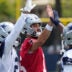 Jul 22, 2025; Oxnard, CA, USA; Dallas Cowboys quarterback Will Grier (15) with running back Javonte Williams (33) during training camp at the River Ridge Fields.