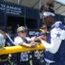 Jul 27, 2025; Oxnard, CA, USA; Dallas Cowboys linebacker DeMarvion Overshown (0) signs autographs at training camp at the River Ridge Fields.