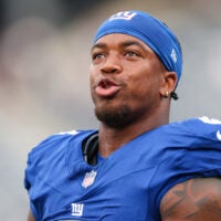 Aug 16, 2025; East Rutherford, New Jersey, USA; New York Giants safety Jevon Holland (8) looks on before the preseason game against the New York Jets at MetLife Stadium.