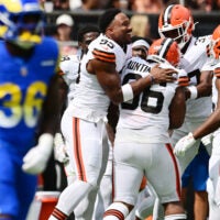 Aug 23, 2025; Cleveland, Ohio, USA; Cleveland Browns defensive end Myles Garrett (95) celebrates with defensive end Adin Huntington (66) after Huntington sacked Los Angeles Rams quarterback Dresser Winn (not pictured) during the second half at Huntington Bank Field.