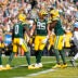Sep 7, 2025; Green Bay, Wisconsin, USA; Green Bay Packers tight end Tucker Kraft (85) celebrates with teammates after scoring a touchdown against the Detroit Lions during the first quarter at Lambeau Field.