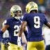 Notre Dame cornerback Karson Hobbs (21) and safety Tae Johnson (9) celebrate after getting a stop in the first half of a NCAA football game against Texas A&M at Notre Dame Stadium on Saturday, Sept. 13, 2025, in South Bend.