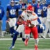 Sep 21, 2025; East Rutherford, New Jersey, USA; Kansas City Chiefs wide receiver Juju Smith-Schuster (9) runs against New York Giants cornerback Paulson Adebo (21) in the second quarter at MetLife Stadium.