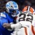 Detroit Lions defensive tackle Tyleik Williams (91) tackles Cleveland Browns running back Dylan Sampson (22) during the first half at Ford Field in Detroit on Sunday, Sept. 28, 2025.