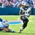 Sep 28, 2025; Orchard Park, New York, USA; New Orleans Saints running back Alvin Kamara (41) nearly fumbles after breaking a tackle by Buffalo Bills defensive end Joey Bosa (97) in the third quarter at Highmark Stadium.