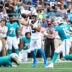 Oct 5, 2025; Charlotte, North Carolina, USA; Carolina Panthers quarterback Bryce Young (9) passes the ball as Miami Dolphins linebacker Jaelan Phillips (15) pressures in the second quarter at Bank of America Stadium.