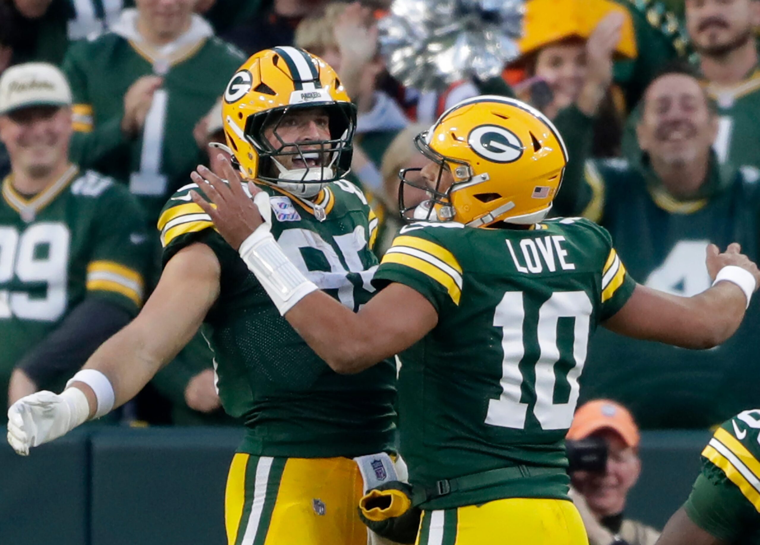 Green Bay Packers tight end Tucker Kraft (85) and quarterback Jordan Love (10) celebrate a fourth quarter touchdown against the Cincinnati Bengals on Sunday, October 12, 2025, at Lambeau Field in Green Bay, Wis.Green Bay defeated Cincinnati 27-18.