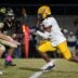 Tai Phillips carries the ball during the Cape Fear at Gray's Creek football game on Friday, Oct. 17, 2025.