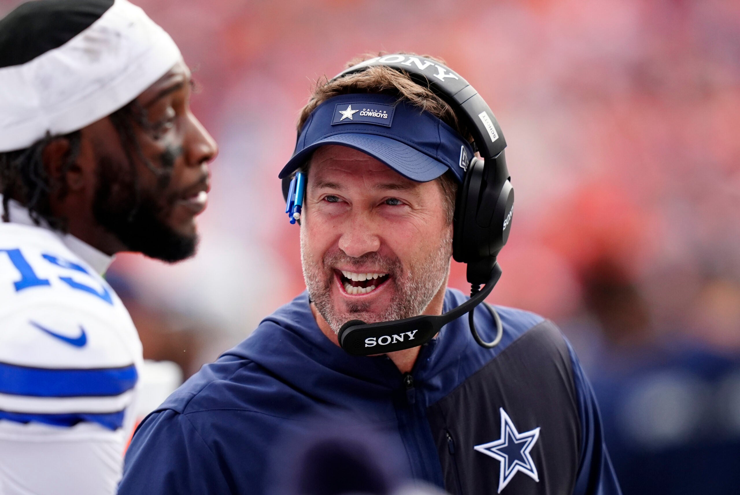 Oct 26, 2025; Denver, Colorado, USA; Dallas Cowboys head coach Brian Schottenheimer reacts in the first half against the Denver Broncos at Empower Field at Mile High.