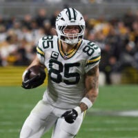 Oct 26, 2025; Pittsburgh, Pennsylvania, USA; Green Bay Packers tight end Tucker Kraft (85) runs after a catch for a touchdown against the Pittsburgh Steelers during the first quarter at Acrisure Stadium.