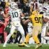 Oct 26, 2025; Pittsburgh, Pennsylvania, USA; Green Bay Packers quarterback Jordan Love (10) passes against Pittsburgh Steelers linebacker T.J. Watt (90) during the second quarter at Acrisure Stadium.