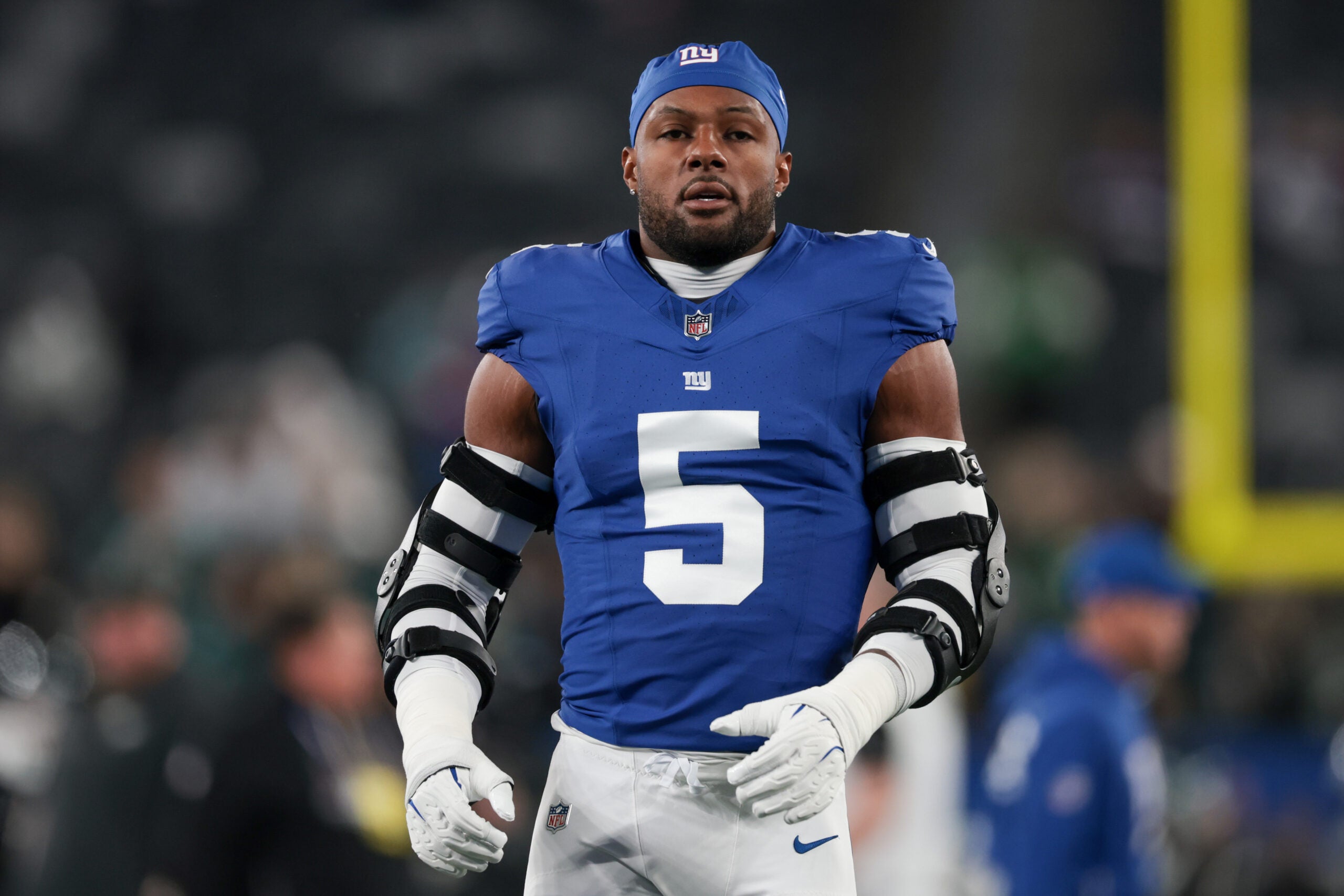 Oct 9, 2025; East Rutherford, New Jersey, USA; (Editors Notes: Caption Correction) New York Giants linebacker Kayvon Thibodeaux (5) looks on during warmups before the game against the Philadelphia Eagles at MetLife Stadium.