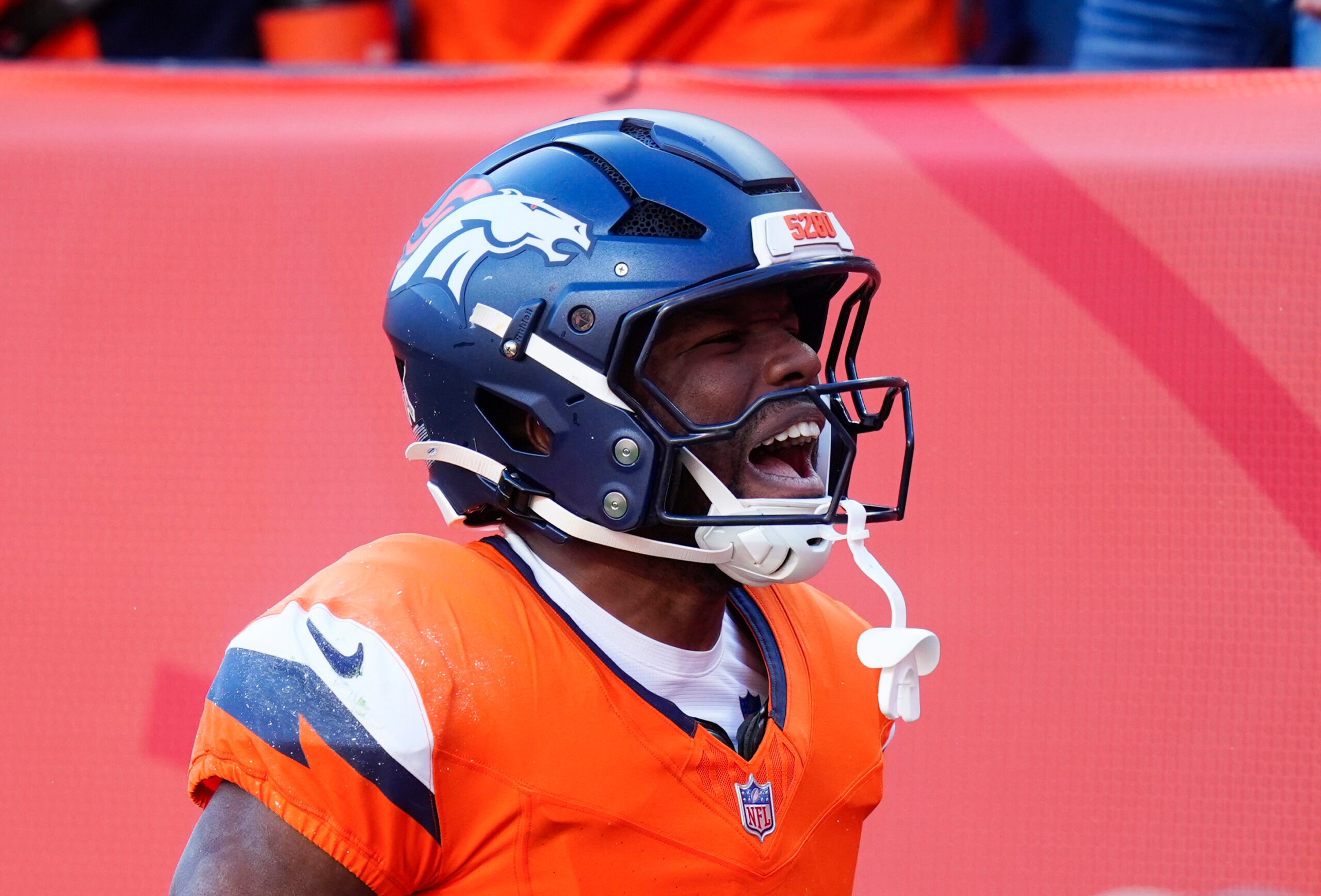 Nov 16, 2025; Denver, Colorado, USA; Denver Broncos wide receiver Marvin Mims Jr. (19) reacts after a punt return against the Kansas City Chiefs during the first quarter of the game at Empower Field at Mile High.