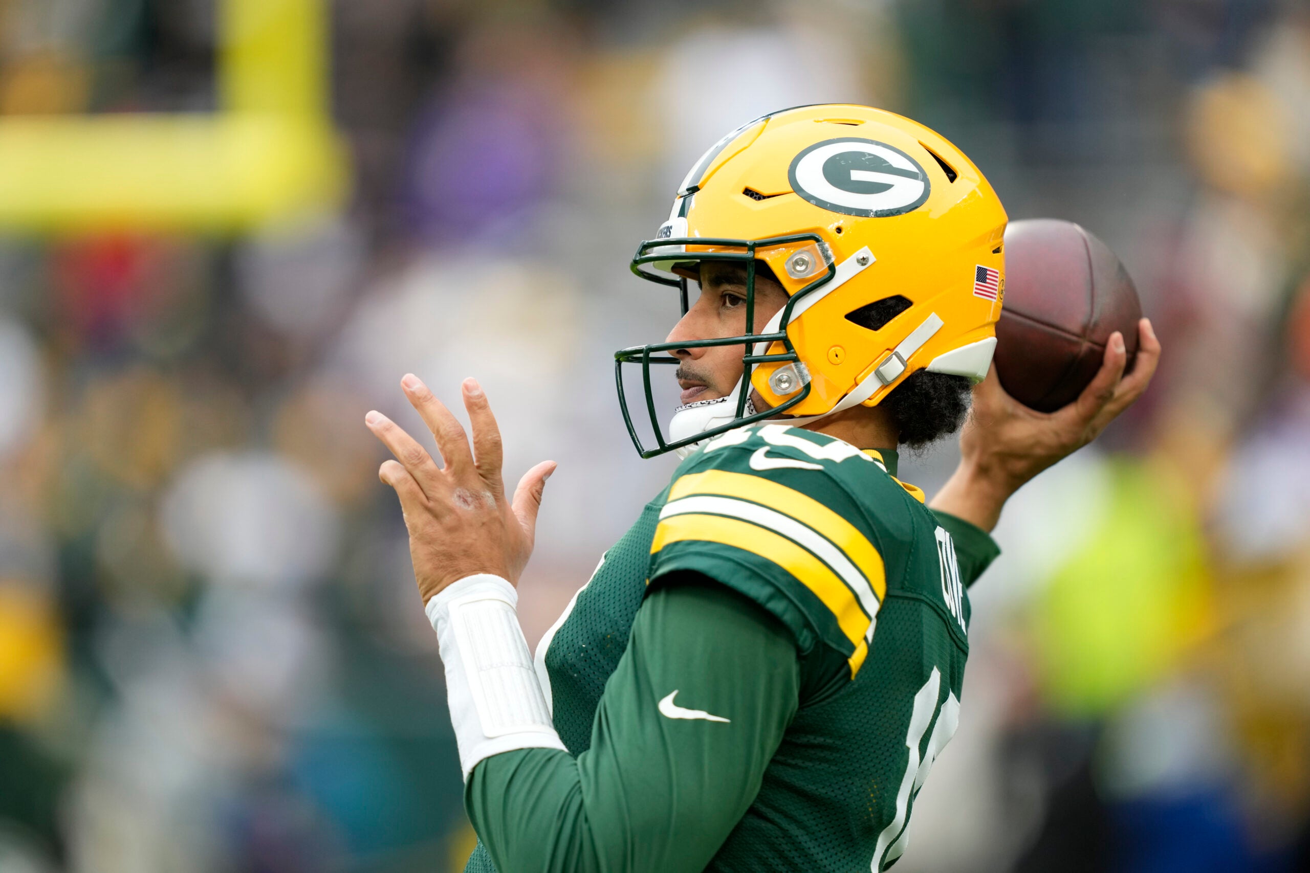 Nov 23, 2025; Green Bay, Wisconsin, USA; Green Bay Packers quarterback Jordan Love (10) warms up prior to a game against the Minnesota Vikings at Lambeau Field.
