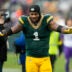 Nov 23, 2025; Green Bay, Wisconsin, USA; Green Bay Packers defensive end Micah Parsons (1) celebrates the victory over the Minnesota Vikings at Lambeau Field.