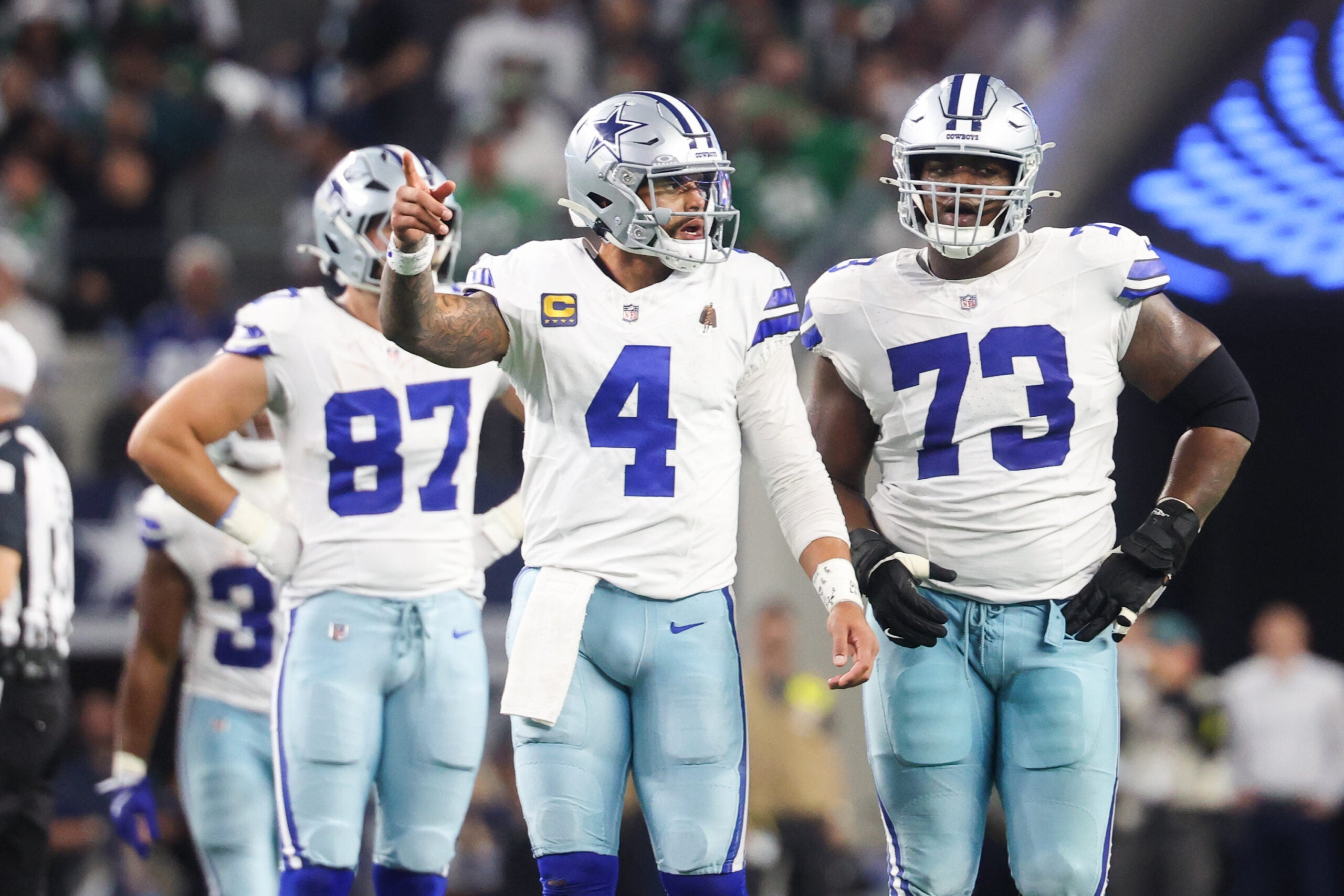 Nov 23, 2025; Arlington, Texas, USA; Dallas Cowboys quarterback Dak Prescott (4) reacts in the third quarter against the Philadelphia Eagles at AT&T Stadium.