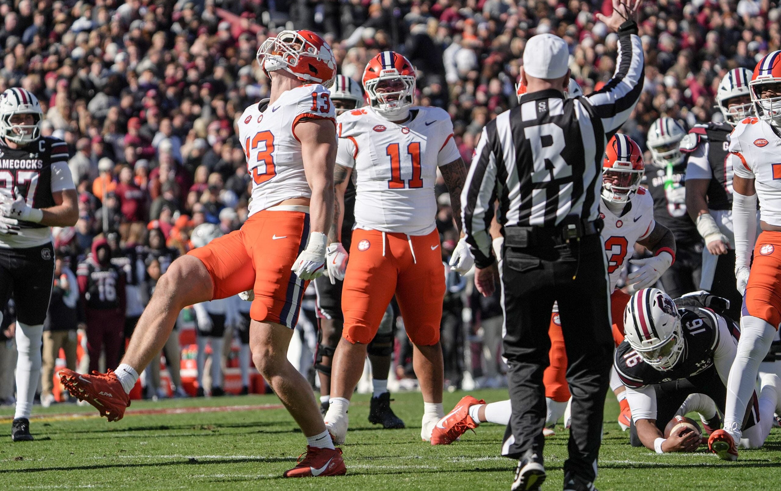 Clemson defensive end Will Heldt (13) reacts after sacking South Carolina quarterback LaNorris Sellers (16) during the first quarter at Williams-Brice Stadium in Columbia, S.C. Saturday, November 29, 2025.
