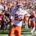 Nov 29, 2025; Columbia, South Carolina, USA; Clemson Tigers cornerback Ashton Hampton (23) celebrates an interception against the South Carolina Gamecocks in the second quarter at Williams-Brice Stadium.