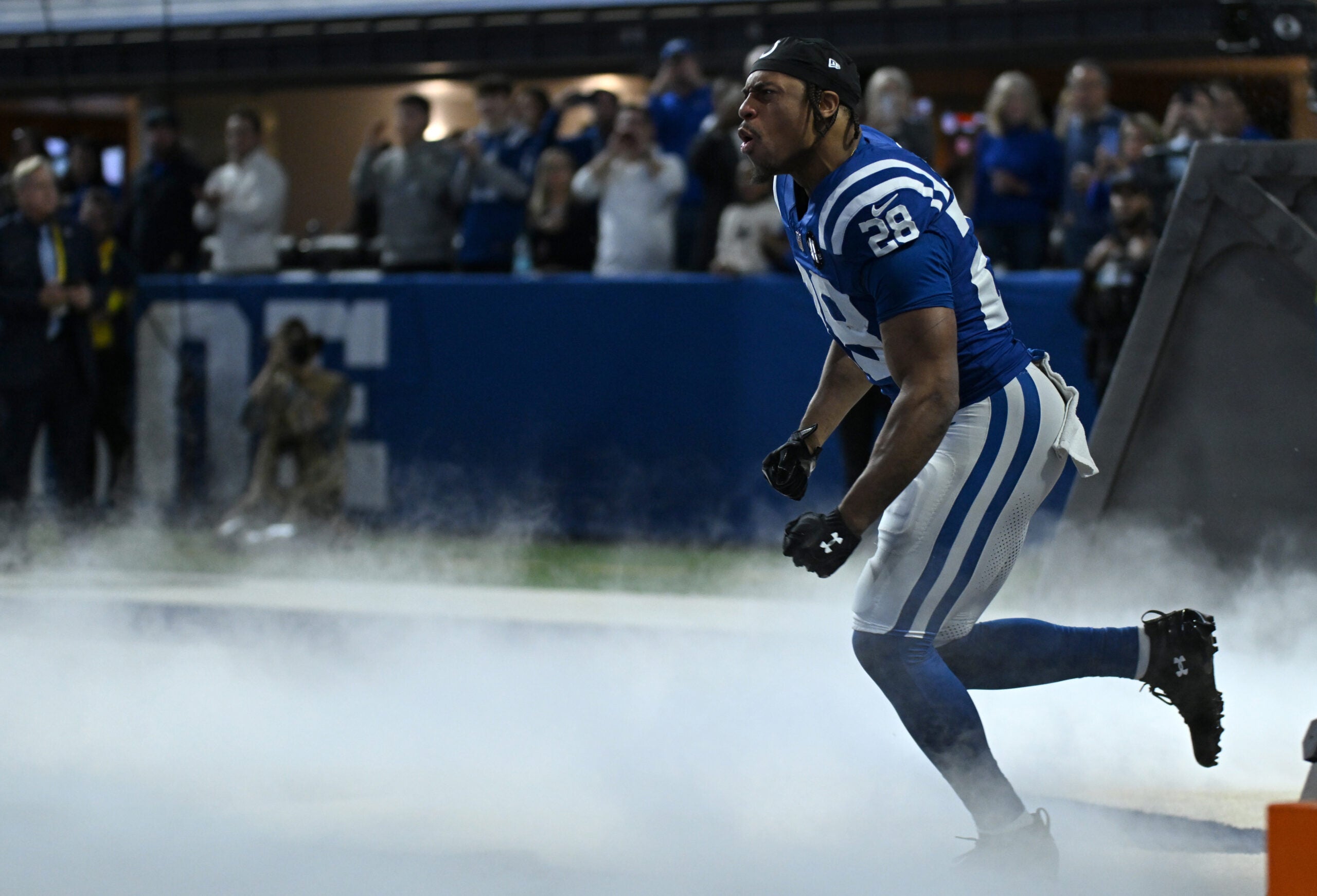 Nov 30, 2025; Indianapolis, Indiana, USA; Indianapolis Colts running back Jonathan Taylor (28) is introduced before a game against the Houston Texans at Lucas Oil Stadium.