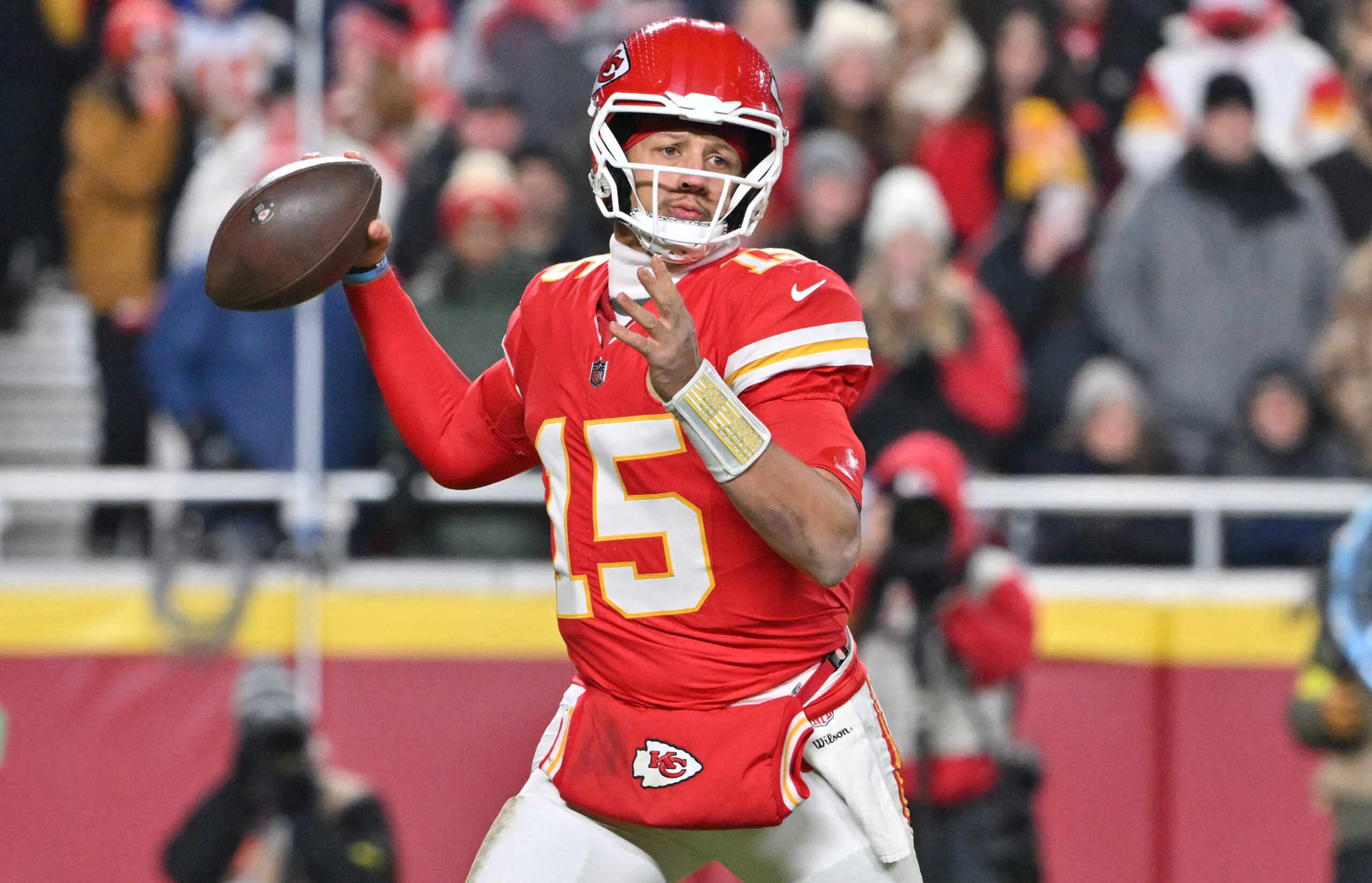 Dec 7, 2025; Kansas City, Missouri, USA; Kansas City Chiefs quarterback Patrick Mahomes (15) throws a pass during the second quarter against the Houston Texans at GEHA Field at Arrowhead Stadium.