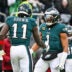 Dec 14, 2025; Philadelphia, Pennsylvania, USA; Philadelphia Eagles wide receiver A.J. Brown (11) and quarterback Jalen Hurts (1) celebrate after scoring a touchdown during the third quarter against the Las Vegas Raiders at Lincoln Financial Field.