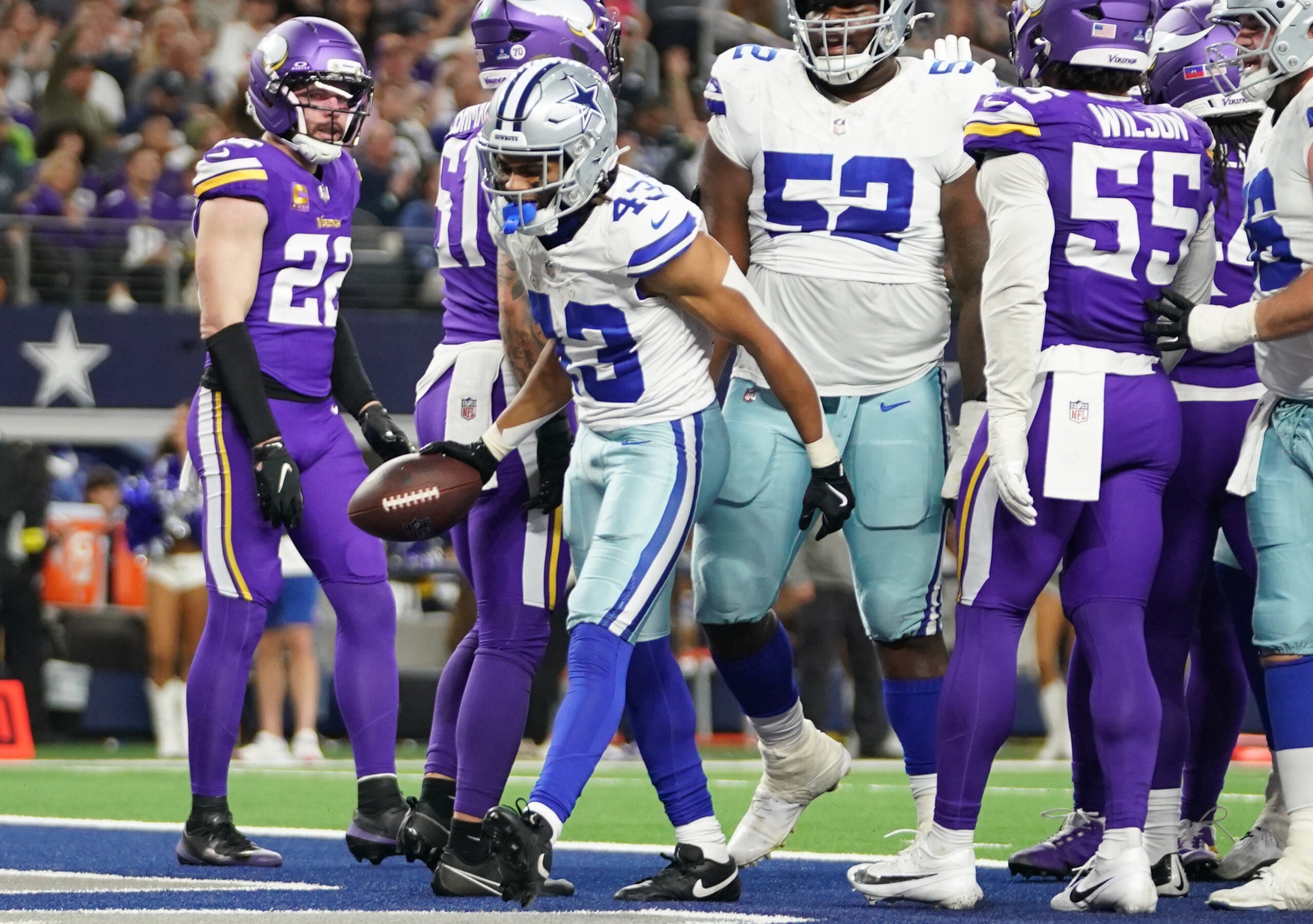 Dec 14, 2025; Arlington, Texas, USA; Dallas Cowboys running back Malik Davis (43) celebrates after a touchdown during the first half against the Minnesota Vikings at AT&T Stadium.