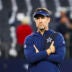 Dec 21, 2025; Arlington, Texas, USA; Dallas Cowboys head coach Brian Schottenheimer watches pregame warmups against the Los Angeles Chargers at AT&T Stadium.