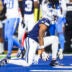 Dec 21, 2025; Arlington, Texas, USA; Dallas Cowboys wide receiver Ryan Flournoy (19) celebrates after catching a touchdown pass against the Los Angeles Chargers during the first quarter at AT&T Stadium.
