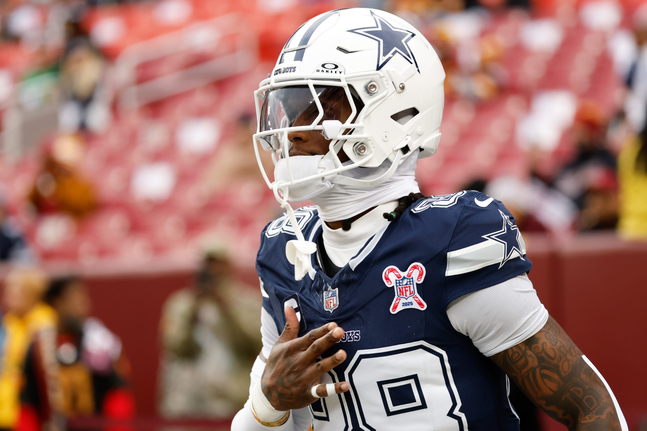 Dec 25, 2025; Landover, Maryland, USA; Dallas Cowboys wide receiver Ceedee Lamb (88) runs onto the field prior to the game against the Washington Commanders at Northwest Stadium.